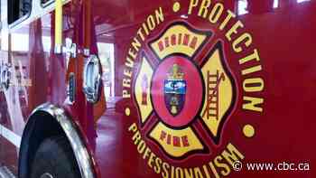 Regina firefighters rescue individual stuck inside garbage truck