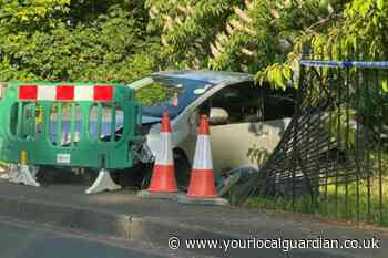 Pound Street Carshalton crash: Car and fence cordoned off