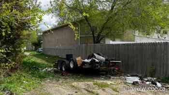 WATCH | Regina woman says city needs to tackle illegal dumping after unwanted trailer left on her lot