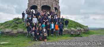 Darwen firm's staff walk to tower for mental health