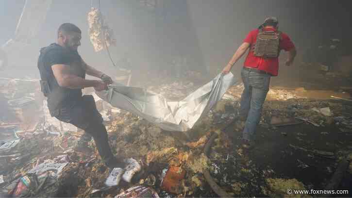 Russian attack destroys train tracks in Ukrainian border region amid evacuation of children