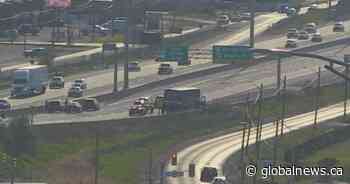 Tire hits tour bus on QEW, killing 1 person and injuring 3, paramedics say