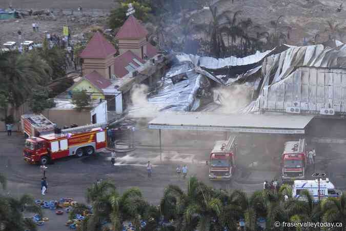 At least 20 dead in a fire in an amusement park in western India, police say.