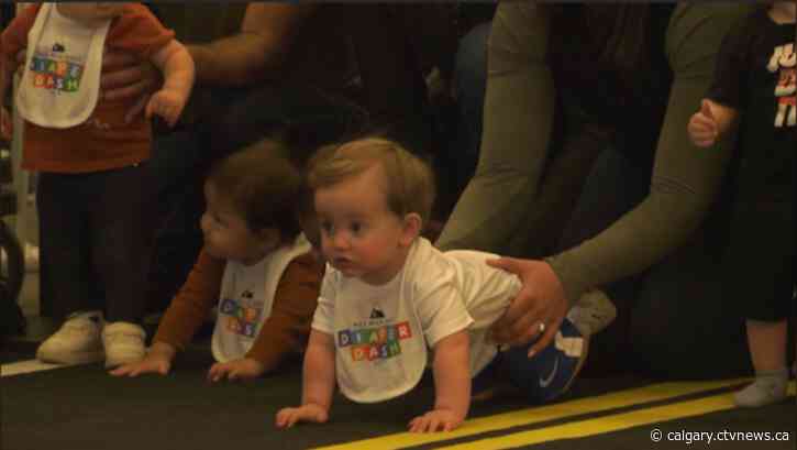 Babies line up for annual diaper dash