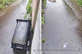 Council teams set to tackle flooded Blackburn alley way