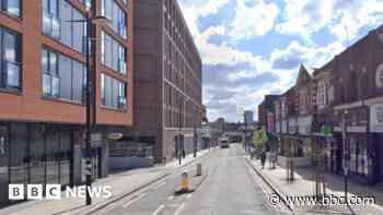 Man charged after three assaulted in bar