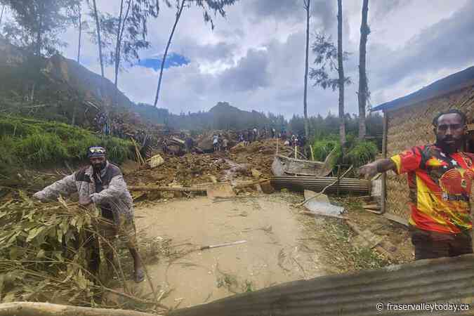 Papua New Guinea government says Friday’s landslide buried 2,000 people and formally asks for help