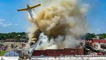 Crop duster drops water on La. restaurant fire