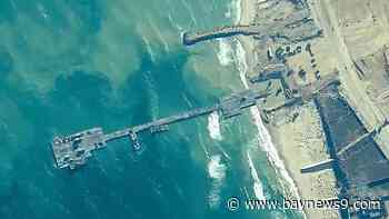 Aid deliveries suspended after rough seas damage U.S.-built temporary pier in Gaza, officials say