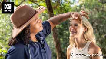 Tour company teaching traditional culture on country honoured at Qld Reconciliation Awards