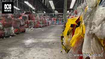 Coles and Woolworths given more time to deal with stranded REDcycle plastic waste