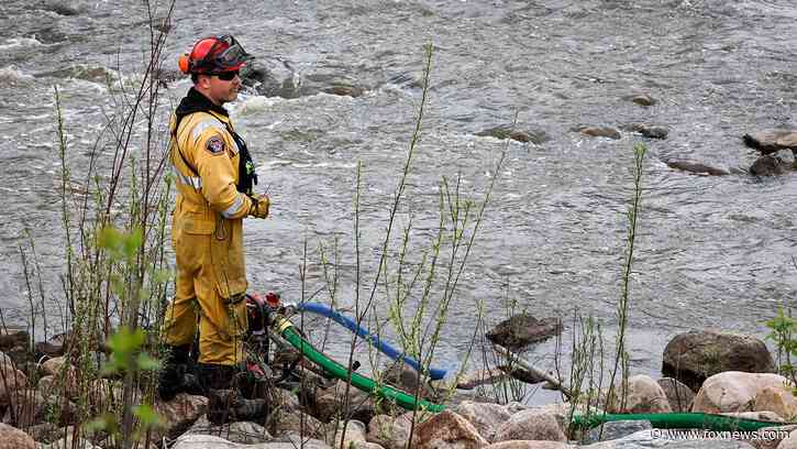 Wildfire near Canada's oil sands hub under control, Alberta officials say