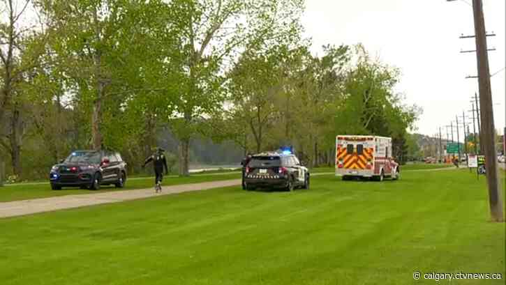 Unresponsive man pulled from Bow River hospitalized in critical condition