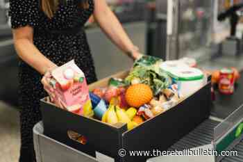 Morrisons brings back cardboard boxes to checkouts