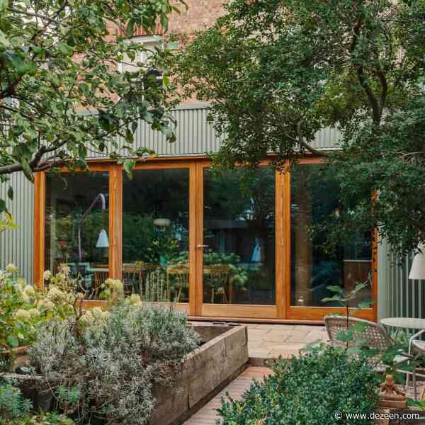 Green zinc panels "camouflage" Folded House in Cambridge by Westerdahl