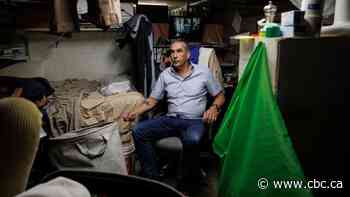 Why this landlord is living in his restaurant basement