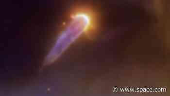 This planet-forming disk shaped like a comet is struggling to survive