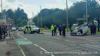 Blackburn: Car overturns in rush hour crash on busy route