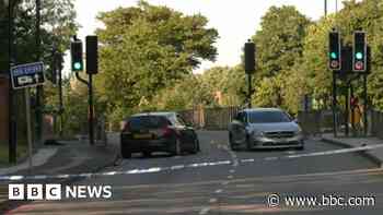 Man held after pedestrian struck in two-car crash