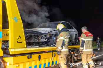 Taxi gaat op de N244 in vlammen op