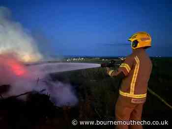 Firefighters extinguish out of control beacon lighting