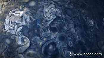 Jupiter's raging gas cyclones may actually mirror Earth's oceans. Here's how