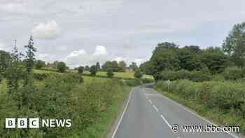 Pedestrian dies and drivers held after two-car crash