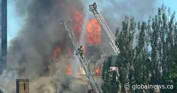 Firefighters battle blaze at historic Toronto church known for Group of Seven murals
