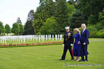 In visit to military cemetery in France, Biden attempts to draw contrast with Trump