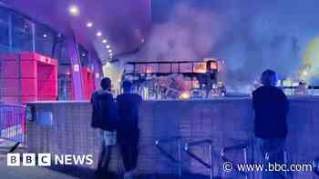 Boy, 14, held on suspicion of arson over bus blaze