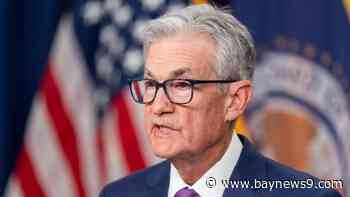 Federal Reserve keeps interest rates unchanged, sees some progress on inflation