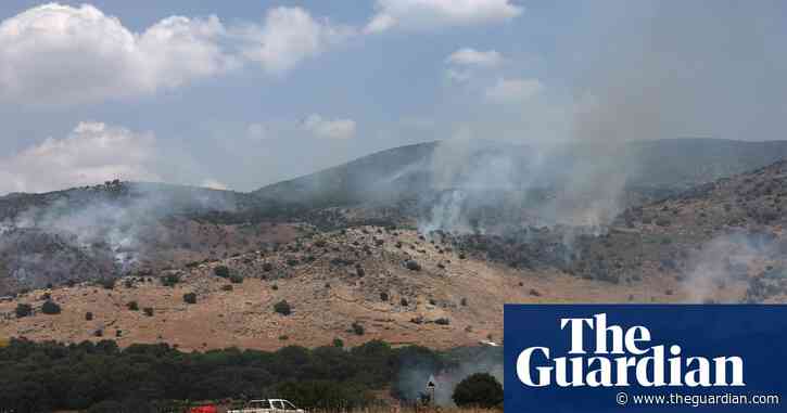 Hezbollah fires big salvo of rockets at Israel after senior commander killed