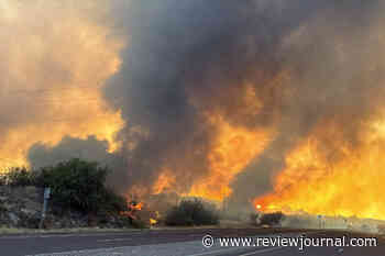 Wildfire claims 6 homes near Arizona town, shuts Phoenix-to-Las Vegas highway