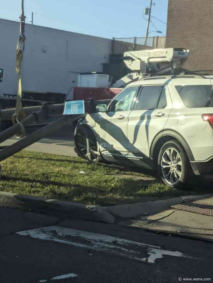 Downtown Fort Wayne crash takes out street signs: minor injuries