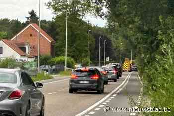 Politiemotard botst met auto op Meylandtlaan in Zolder: agent lichtgewond