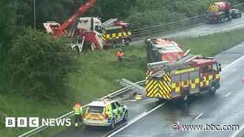 Firefighters taken to hospital after  crash