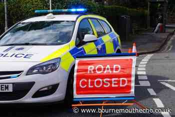 Alder Road blocked after car and motorbike crash