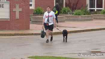 'Just always there': Dog guides help Moose Jaw student cope with symptoms of autism