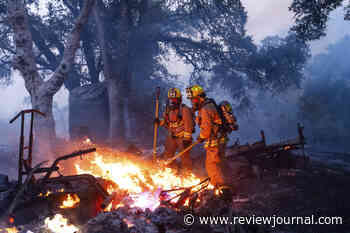 California firefighters gain ground against big weekend wildfires