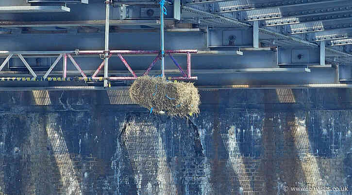 Ancient law requires a bale of straw to hang from a railway bridge