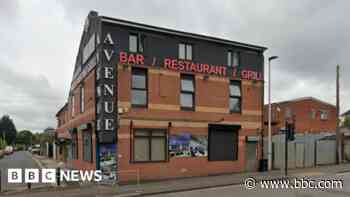 Arrest after gun fired in bar injured three