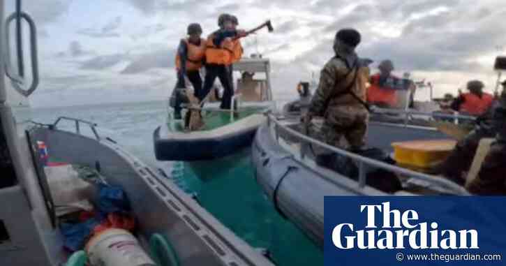 Philippines accuses Chinese coastguards of piracy after violent confrontation