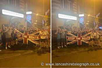 Burnley man criticised over 'embarrassing' anti-refugee flag