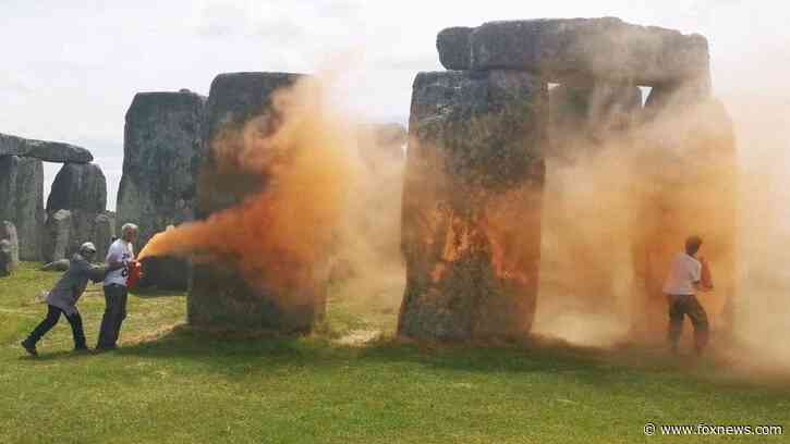 Climate activists spray Stonehenge with orange powder, demanding end to fossil fuels in UK