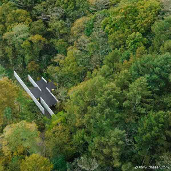 Angled concrete blocks screen home in Japanese forest by Nendo