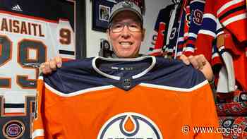 Diehard Oilers fans from Saskatoon cheer with their hearts, and statistics