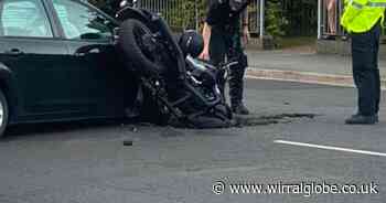 Motorcyclist left with serious leg injury after Birkenhead collision