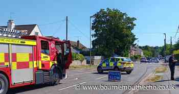 Road cordoned off after lorry collides with power cable