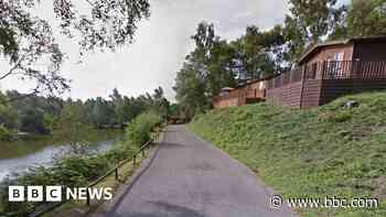 Police release pair over holiday park lake death