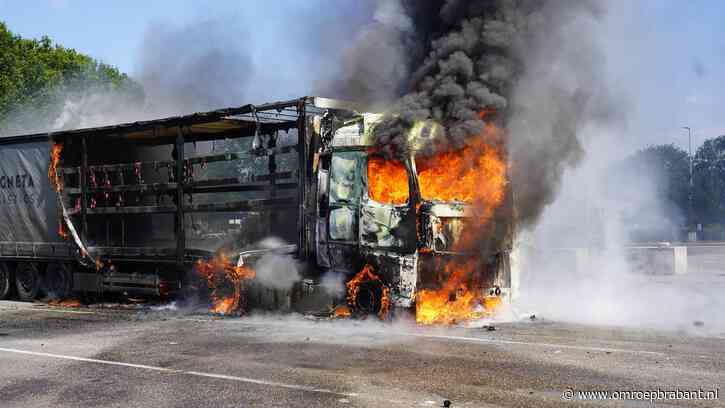 Vrachtwagen brandt uit op parkeerplaats langs A58, chauffeur zwaargewond